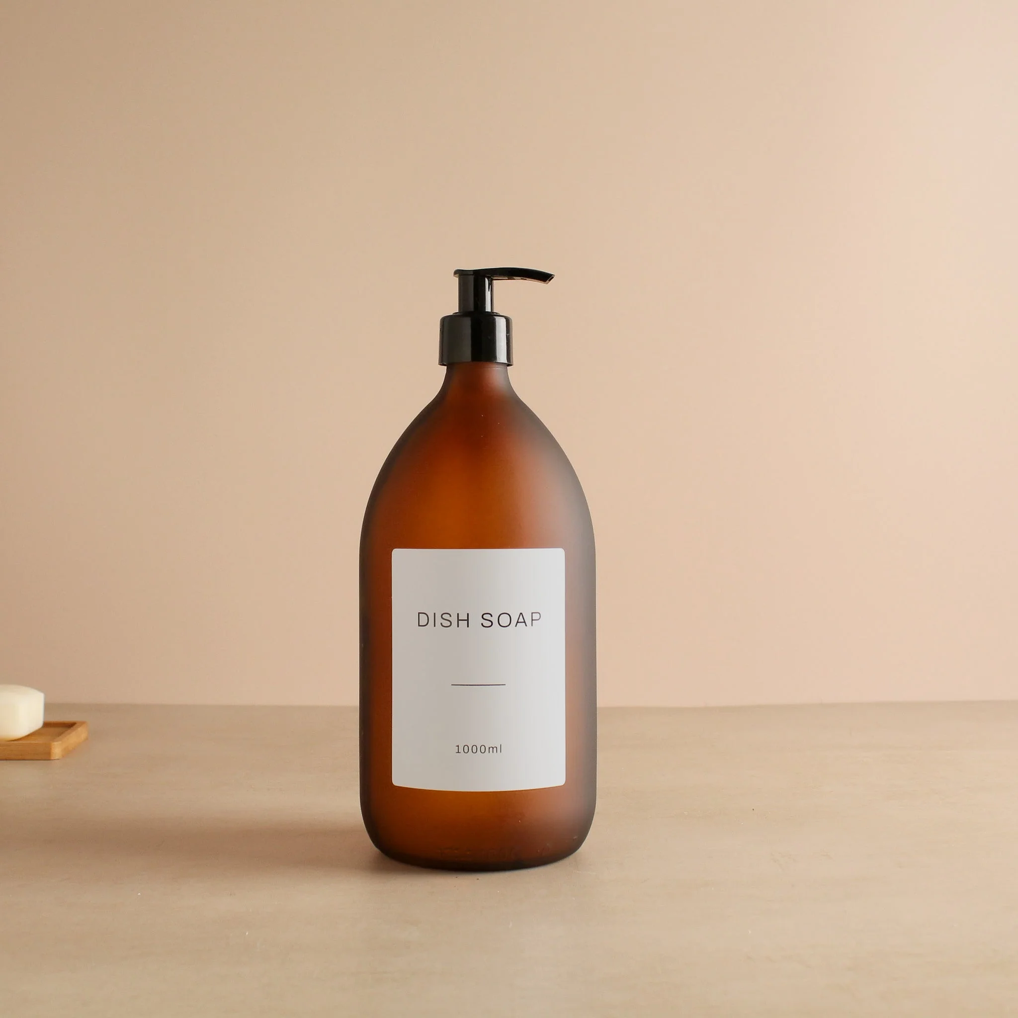 Labelled Frosted Amber Glass Dispenser Bottle With Black Pump - Image 3