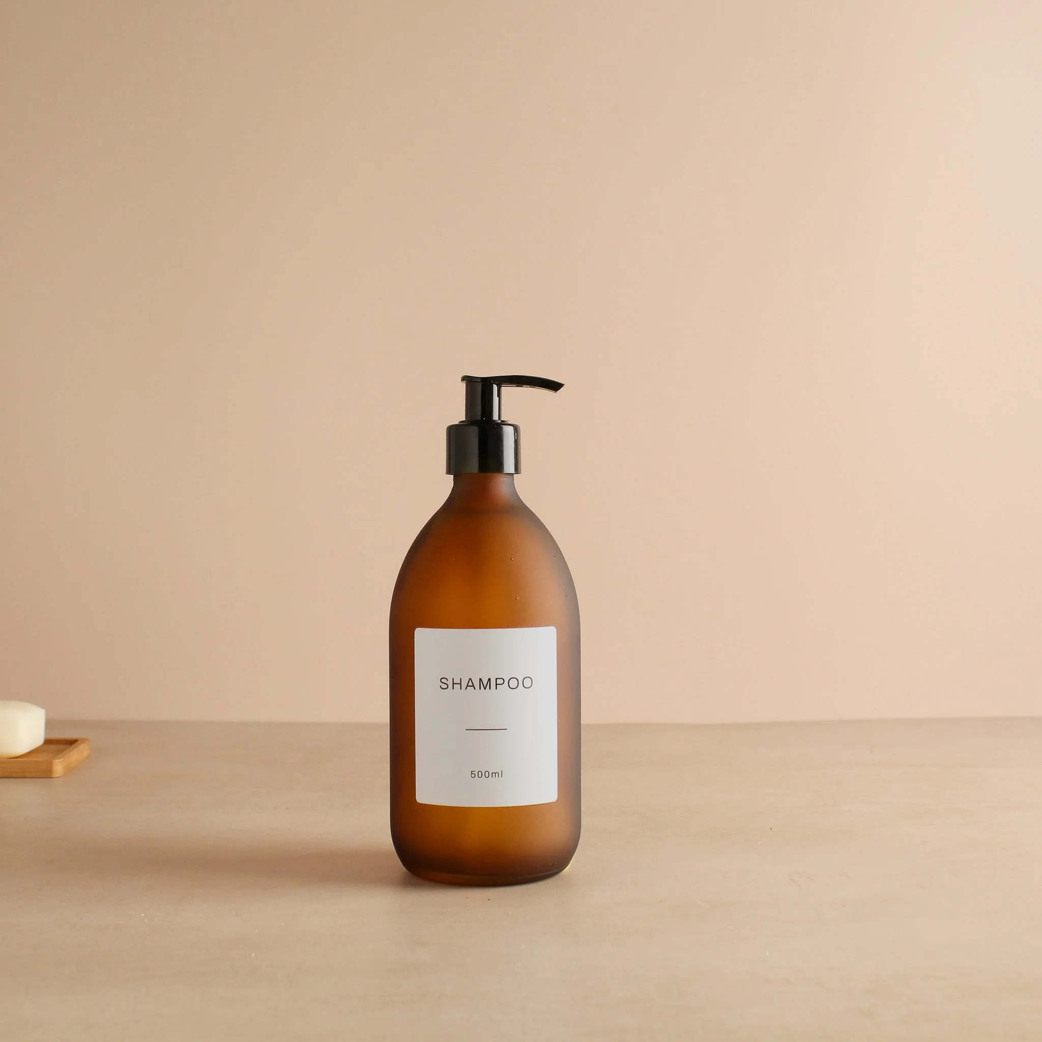 Labelled Frosted Amber Glass Dispenser Bottle With Black Pump - Image 4