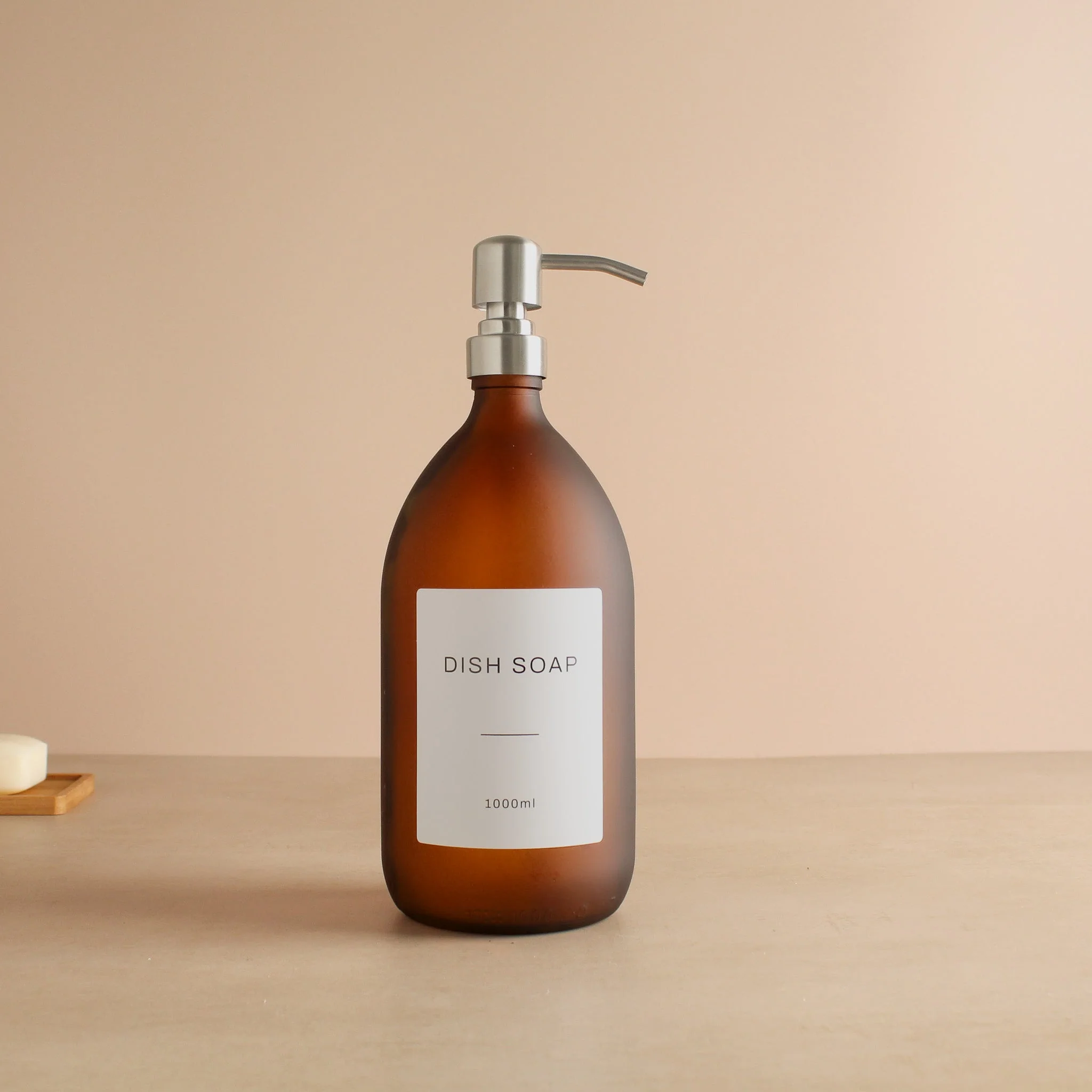 Labelled Frosted Amber Glass Dispenser Bottle With Silver Pump - Image 3