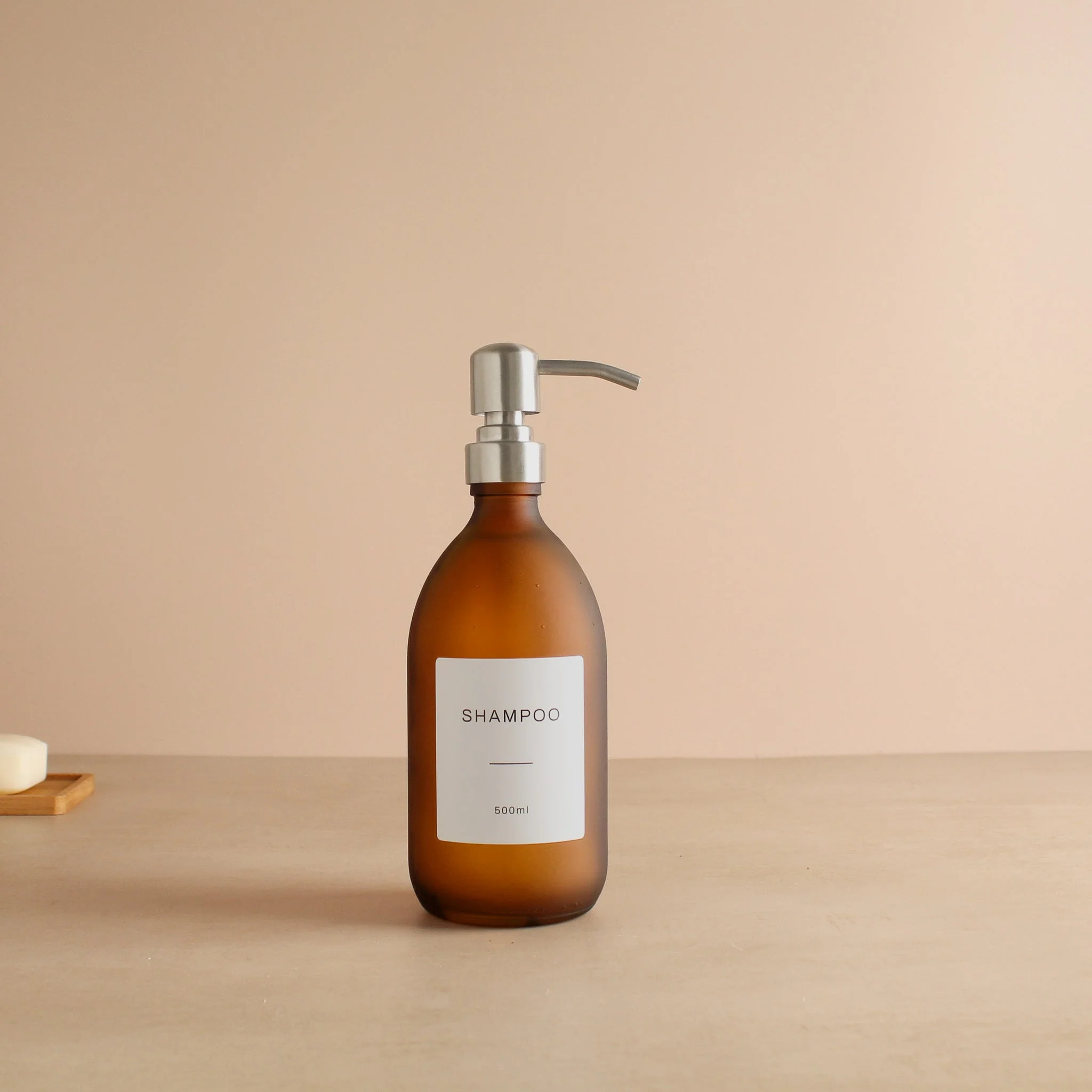 Labelled Frosted Amber Glass Dispenser Bottle With Silver Pump - Image 4