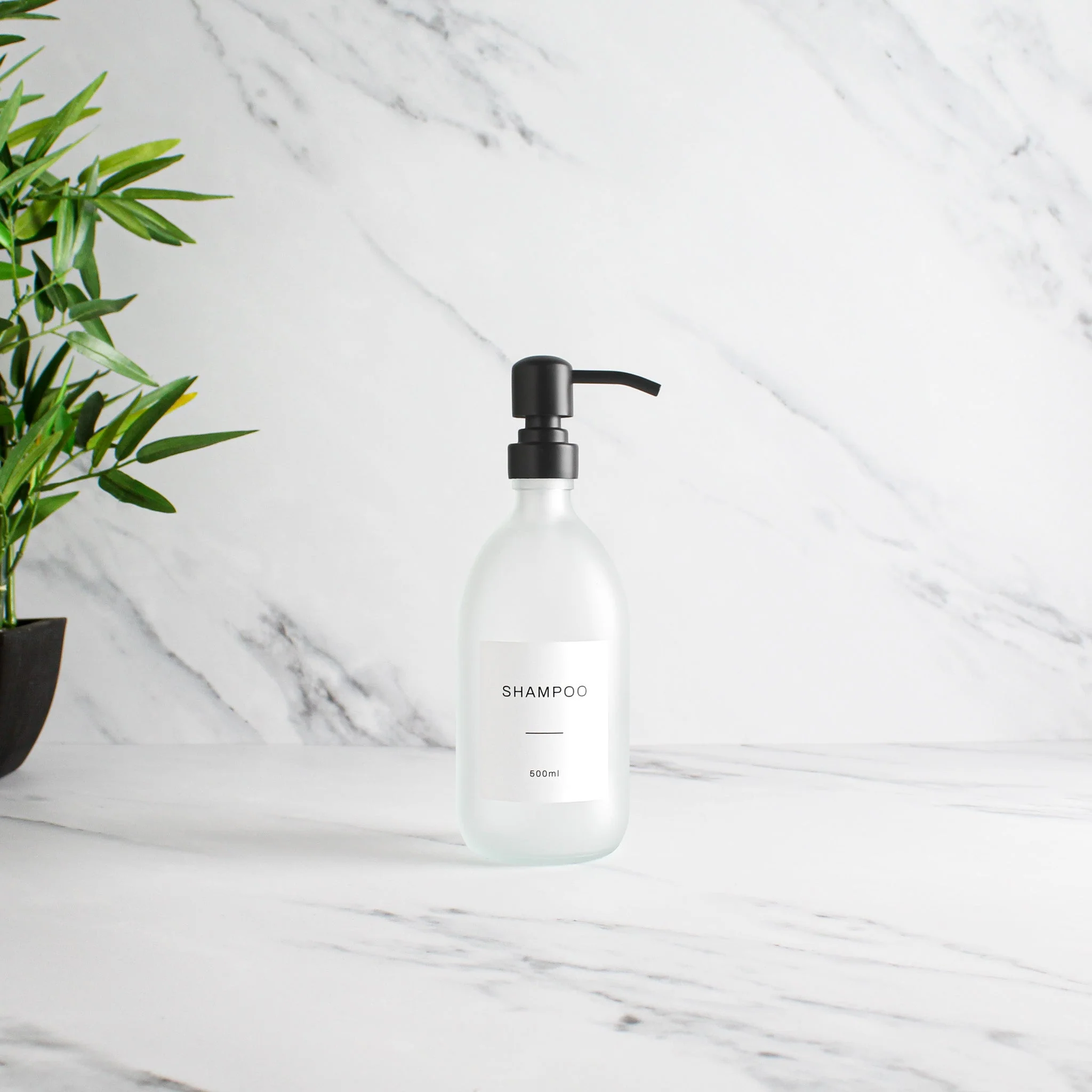 Labelled Frosted White Glass Dispenser Bottle With Matte Black Pump - Image 4
