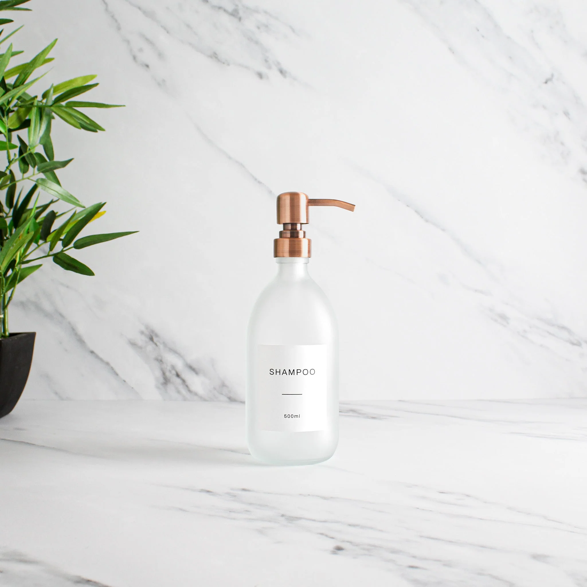 Labelled Frosted White Glass Dispenser Bottle With Rose Gold Pump - Image 4
