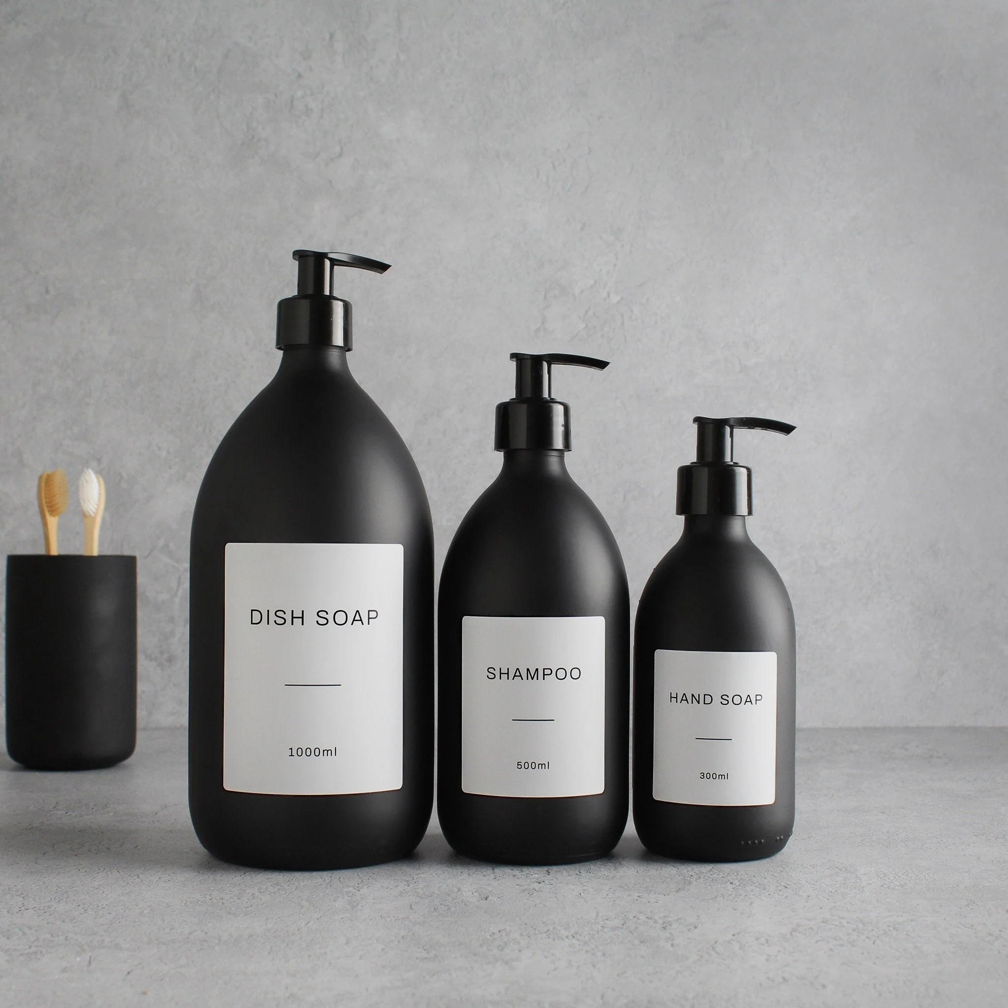 Labelled Matte Black Glass Dispenser Bottle With Black Pump - Image 2