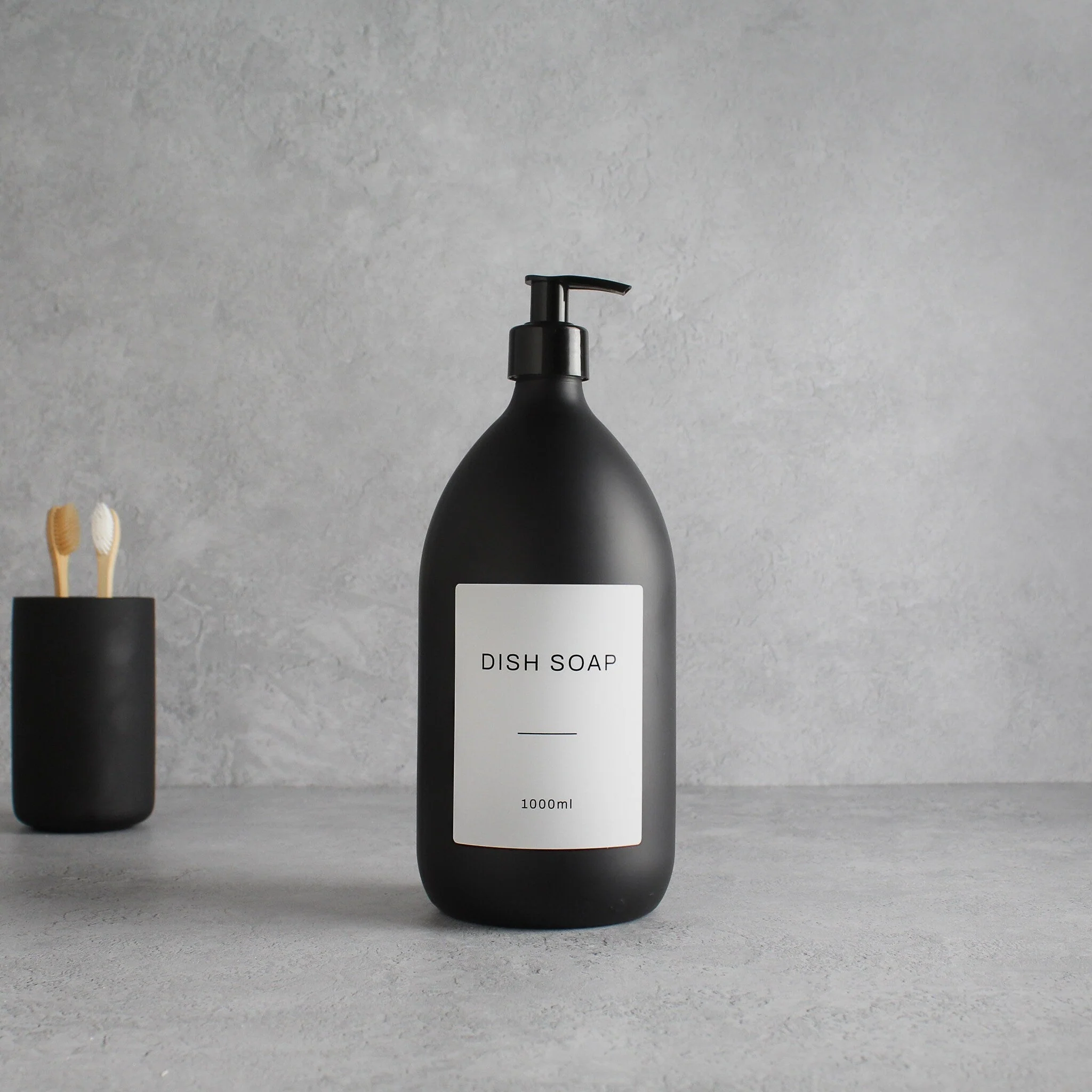 Labelled Matte Black Glass Dispenser Bottle With Black Pump - Image 3