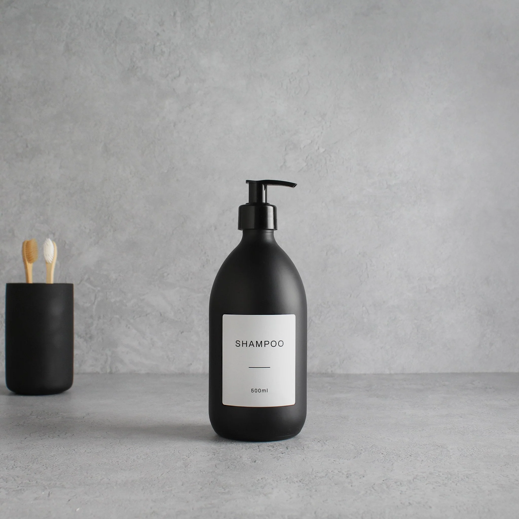 Labelled Matte Black Glass Dispenser Bottle With Black Pump - Image 4