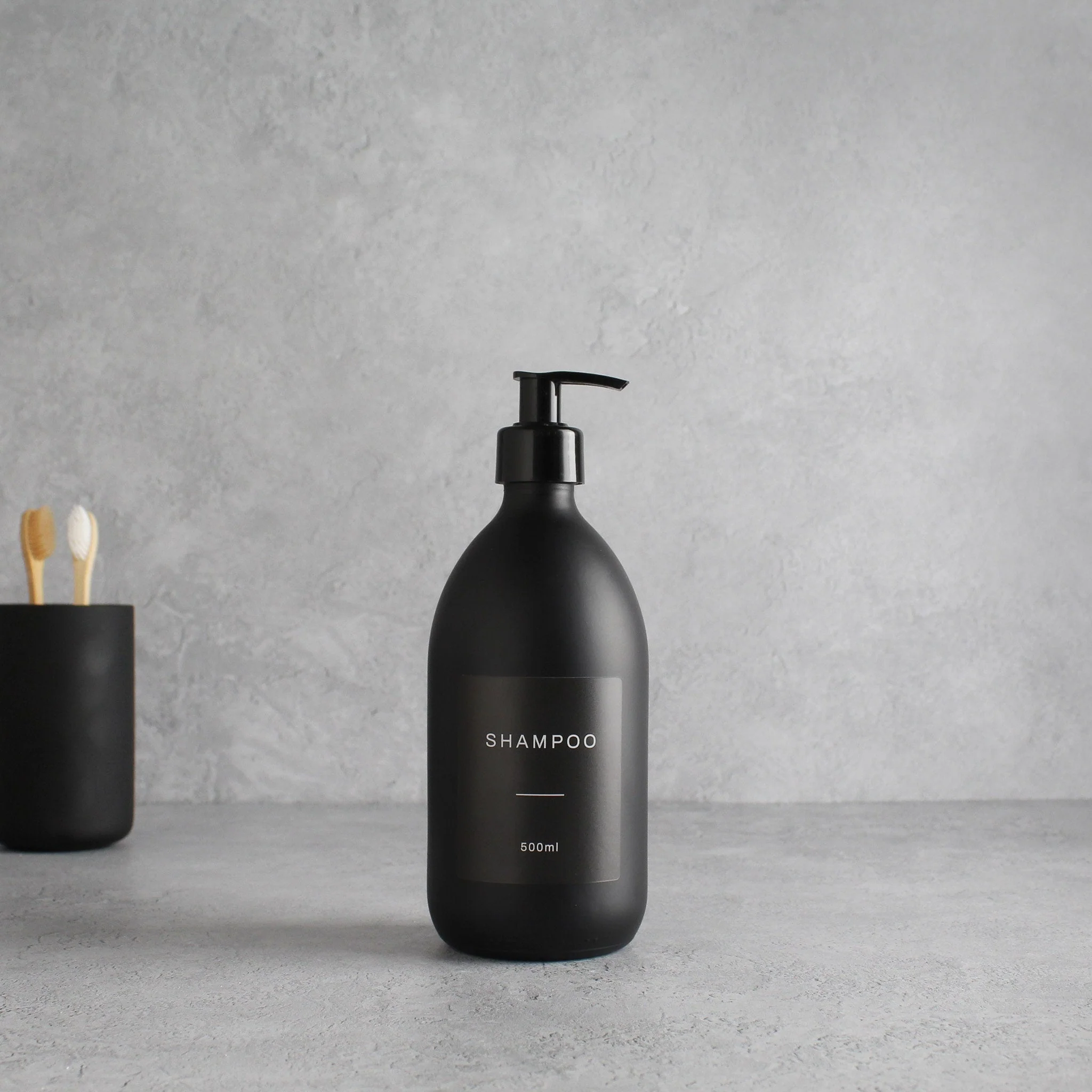 Labelled Matte Black Glass Dispenser Bottle With Black Pump - Image 4