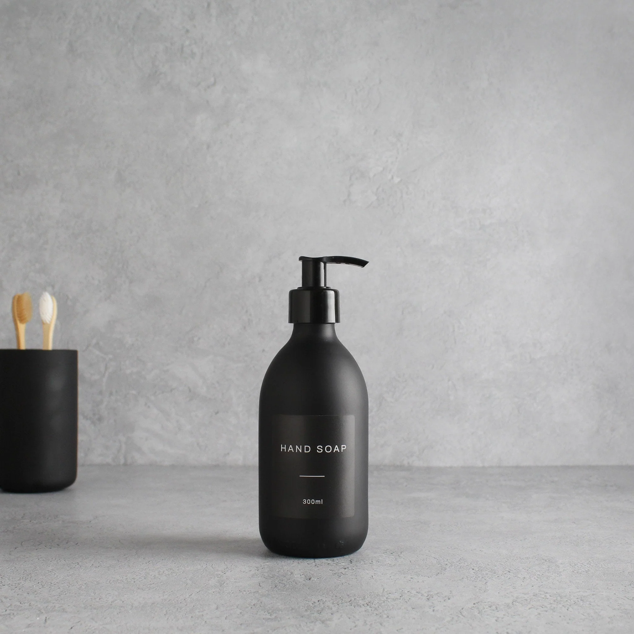 Labelled Matte Black Glass Dispenser Bottle With Black Pump - Image 5