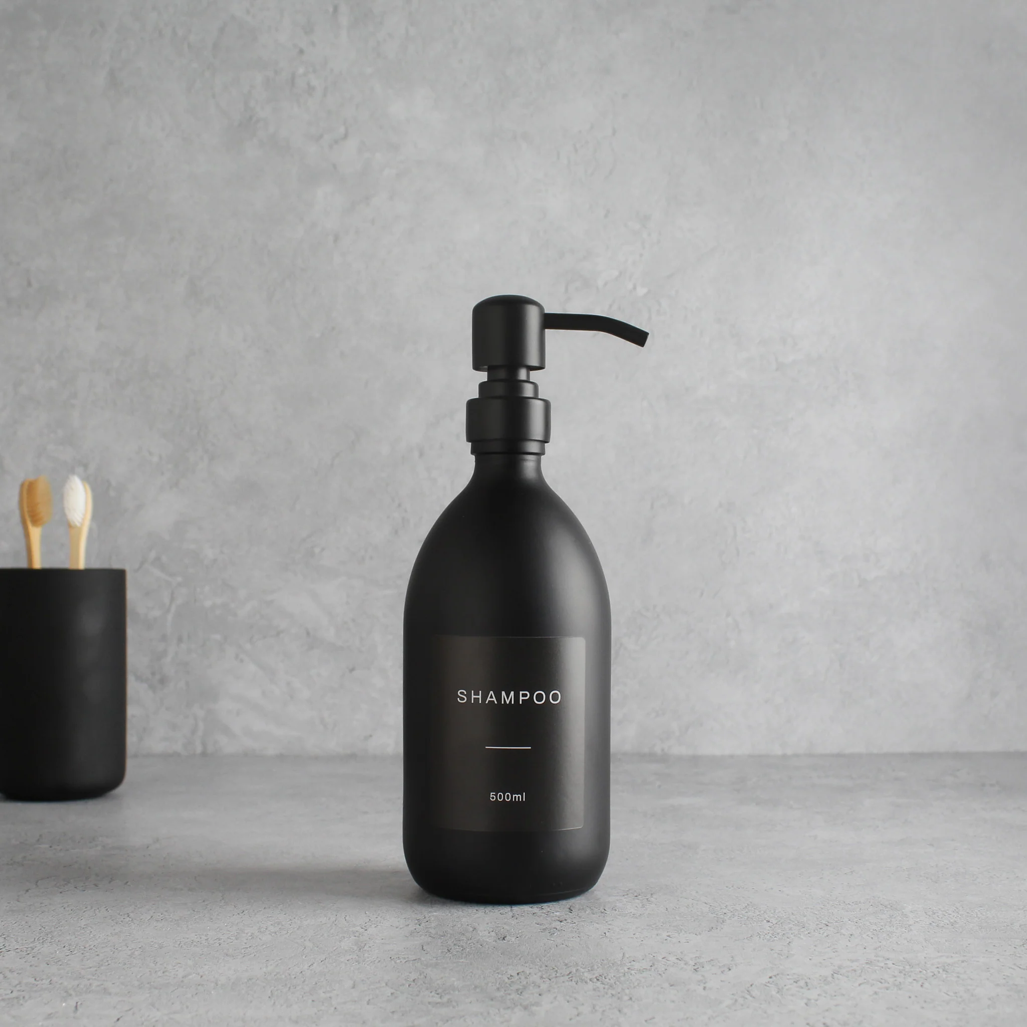 Labelled Matte Black Glass Dispenser Bottle With Matte Black Pump - Image 3