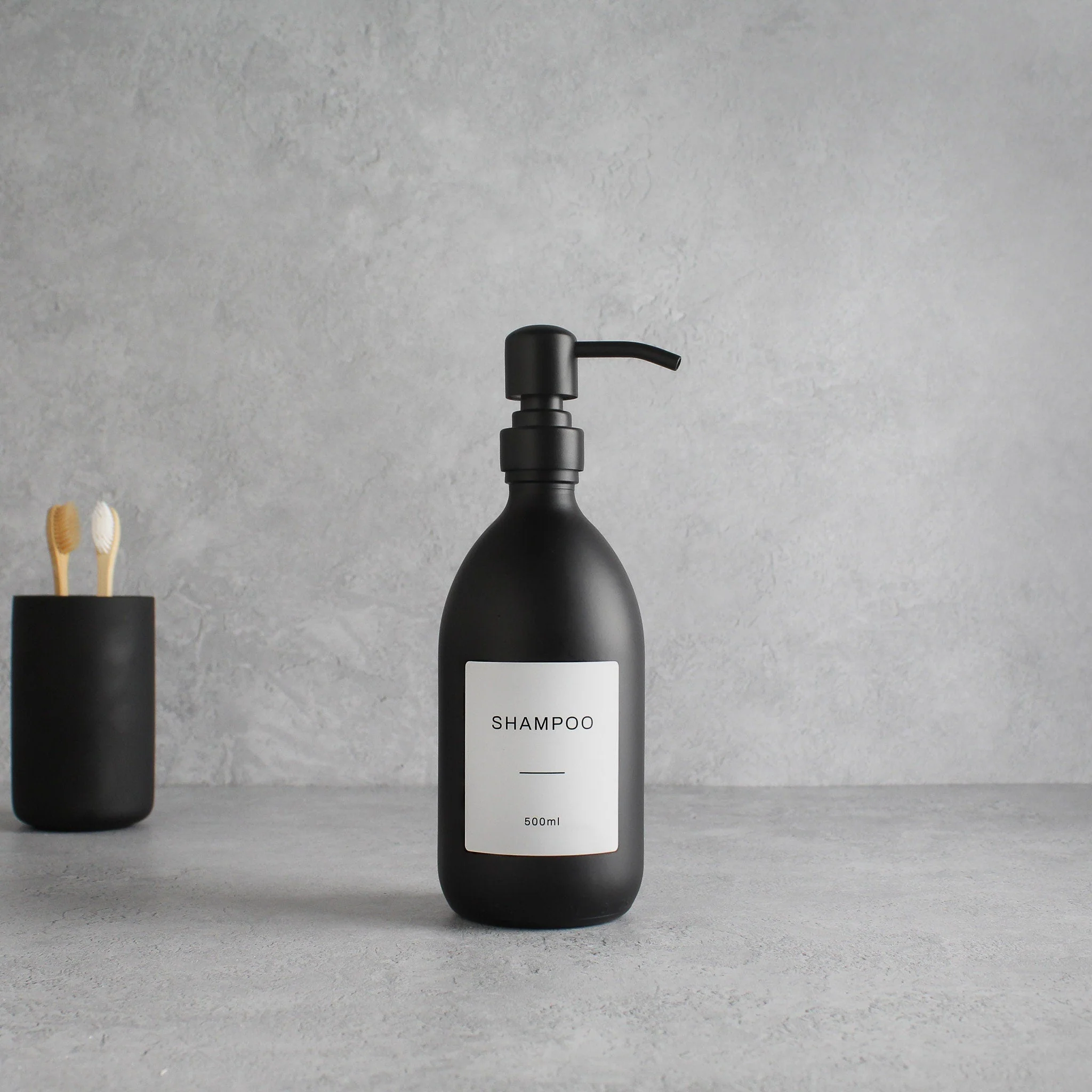 Labelled Matte Black Glass Dispenser Bottle With Matte Black Pump - Image 8
