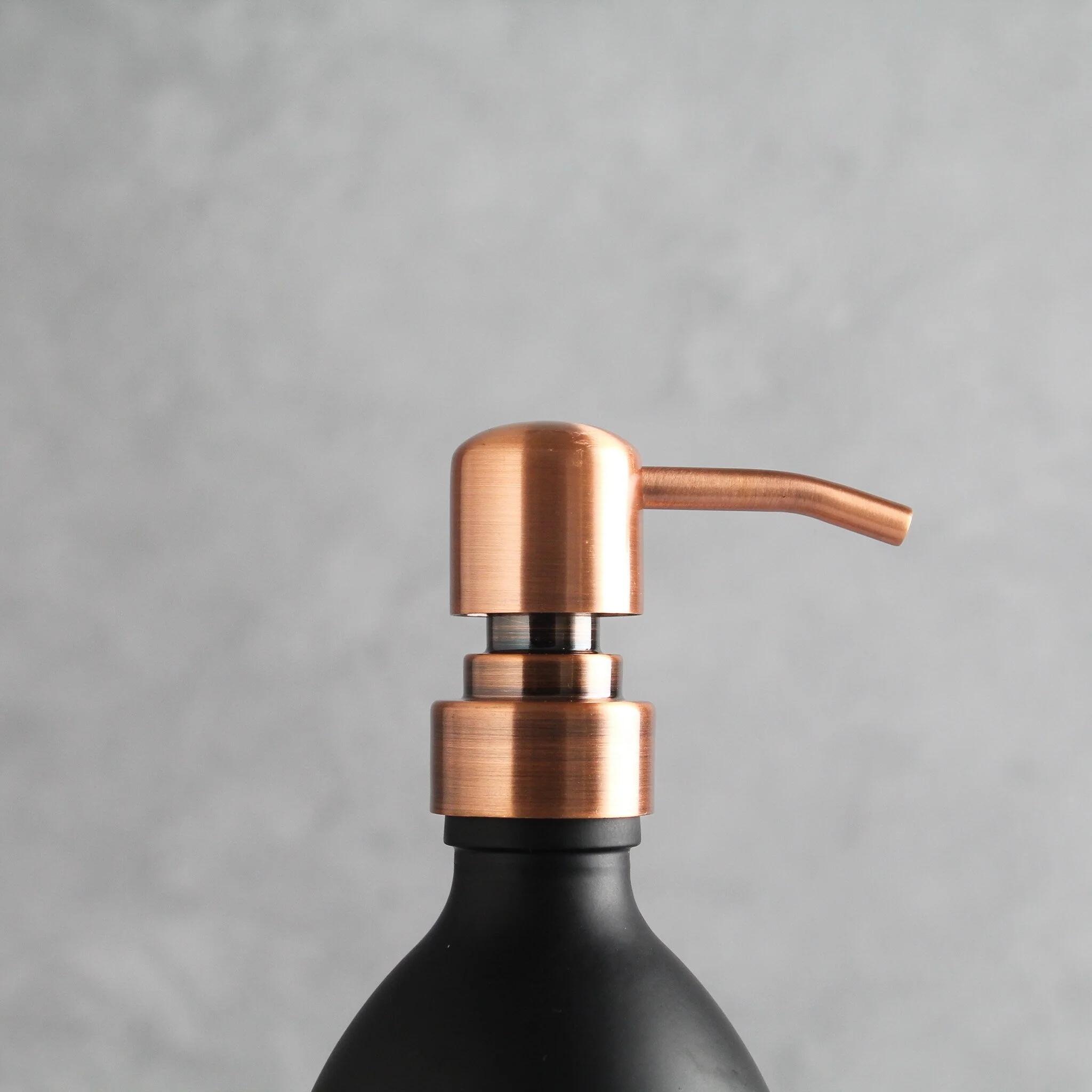 Labelled Matte Black Glass Dispenser Bottle With Rose Gold Pump - Image 6