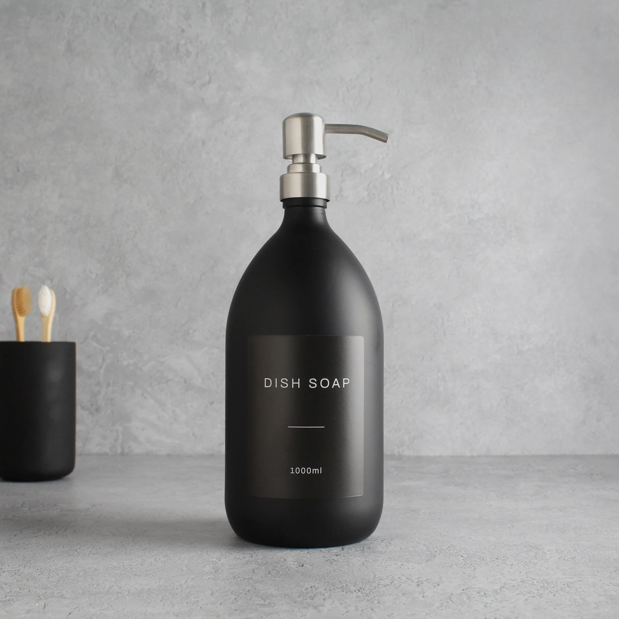 Labelled Matte Black Glass Dispenser Bottle With Silver Pump - Image 3
