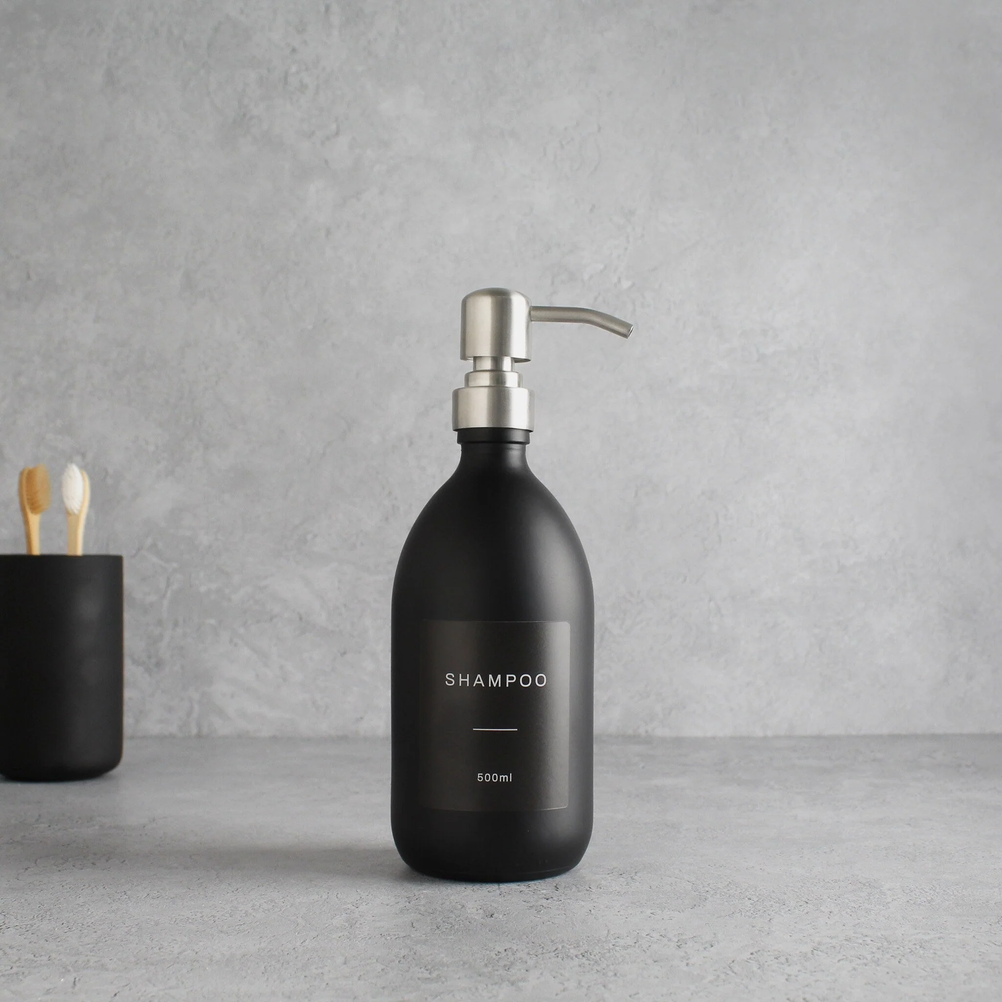 Labelled Matte Black Glass Dispenser Bottle With Silver Pump - Image 4