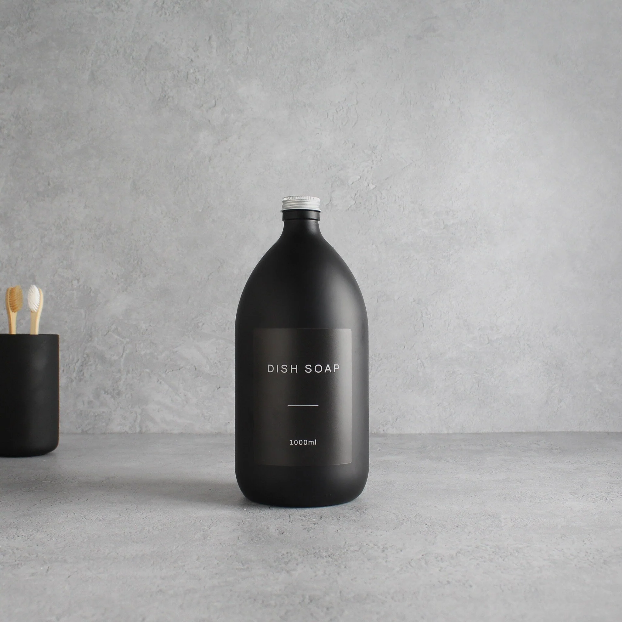 Labelled Matte Black Glass Bottle With Screw Cap - Image 3