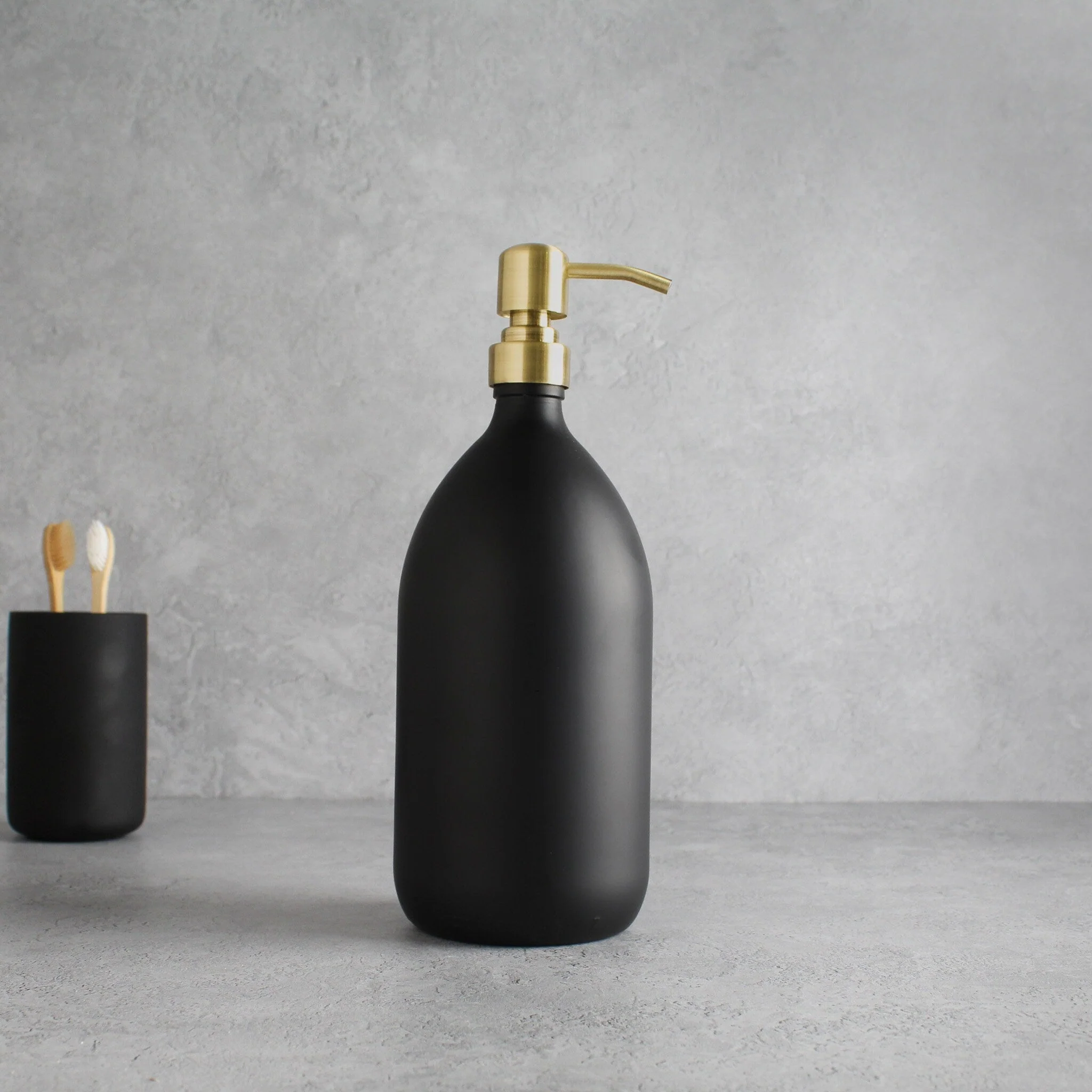 Matte Black Glass Dispenser Bottle With Gold Pump - Image 3