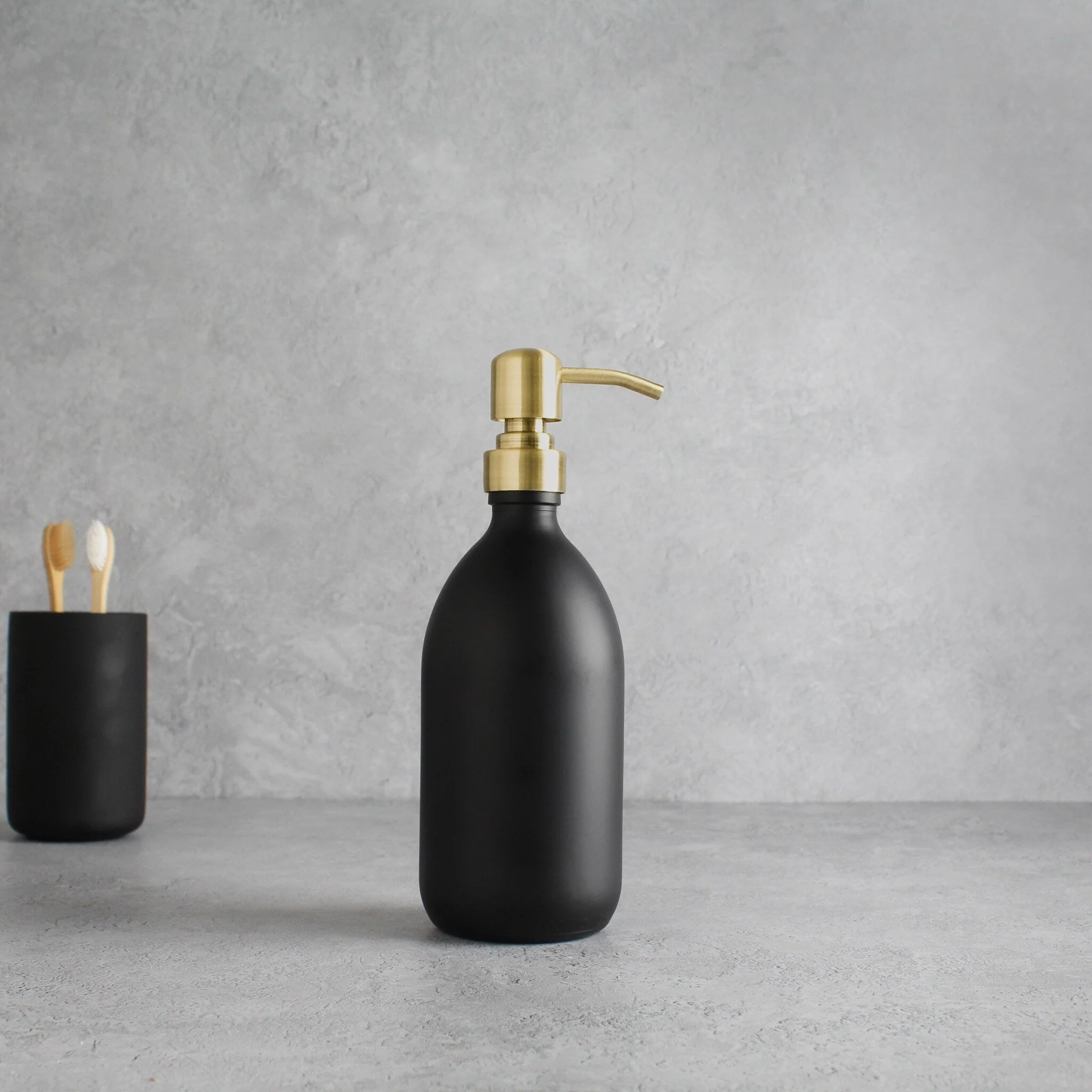 Matte Black Glass Dispenser Bottle With Gold Pump - Image 4