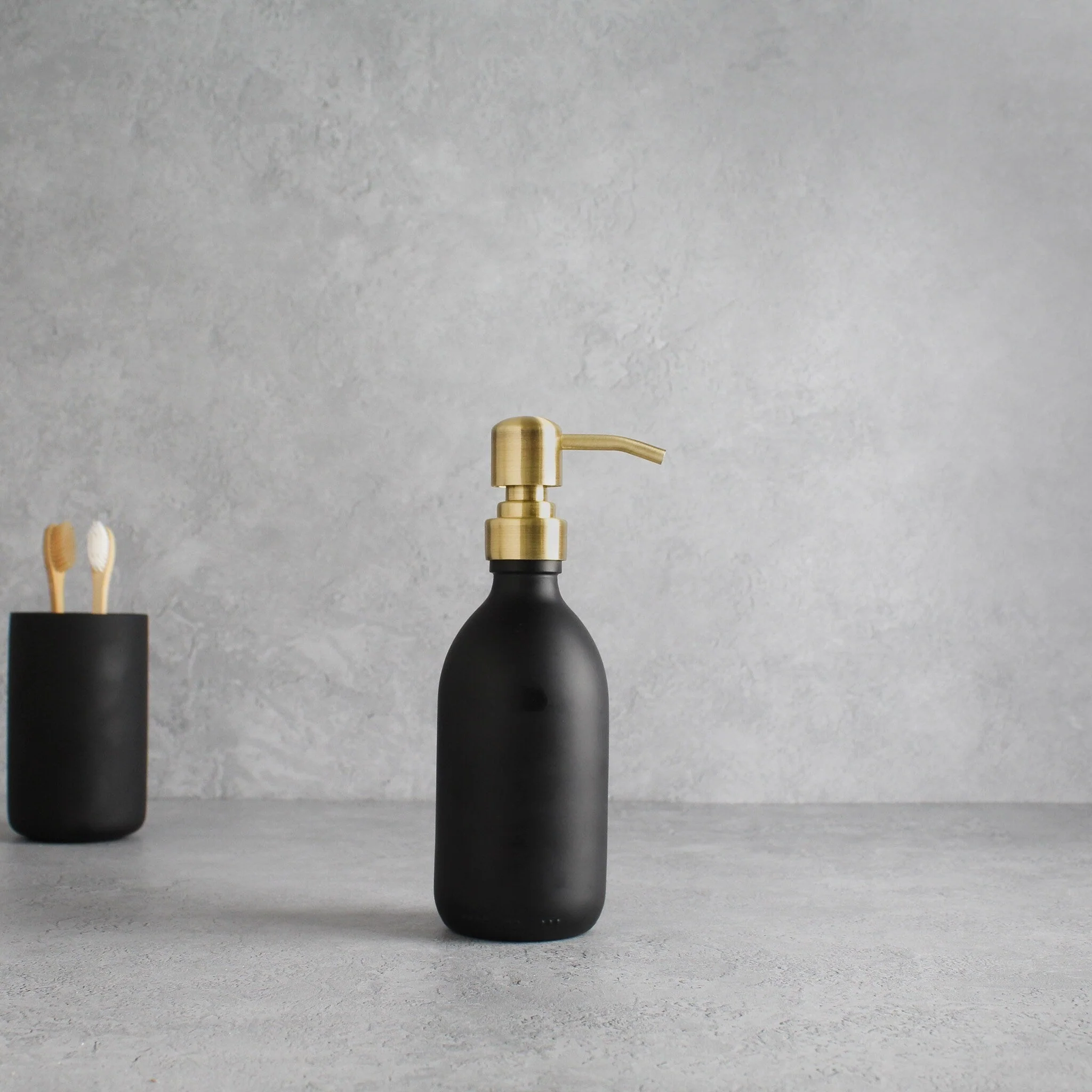 Matte Black Glass Dispenser Bottle With Gold Pump - Image 5