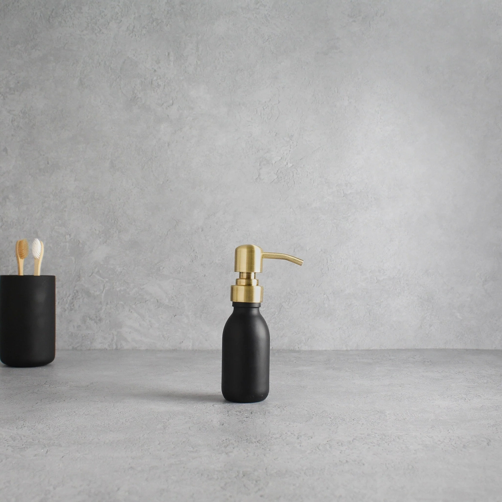 Matte Black Glass Dispenser Bottle With Gold Pump - Image 6