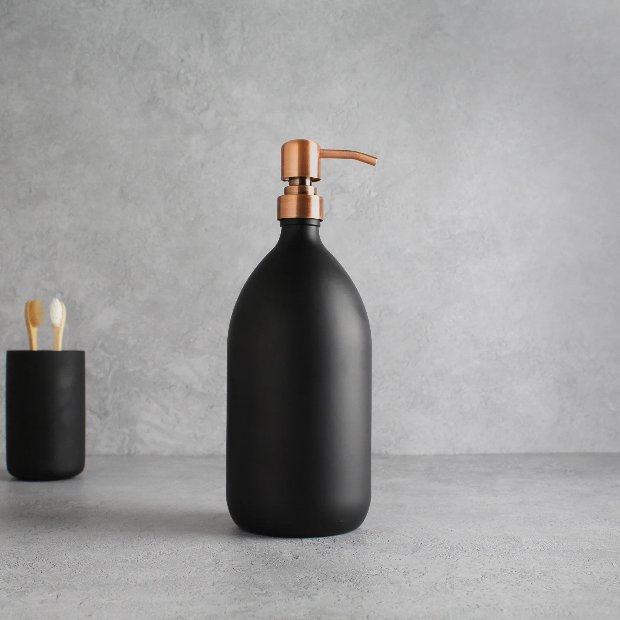 Matte Black Glass Dispenser Bottle With Rose Gold Pump - Image 3