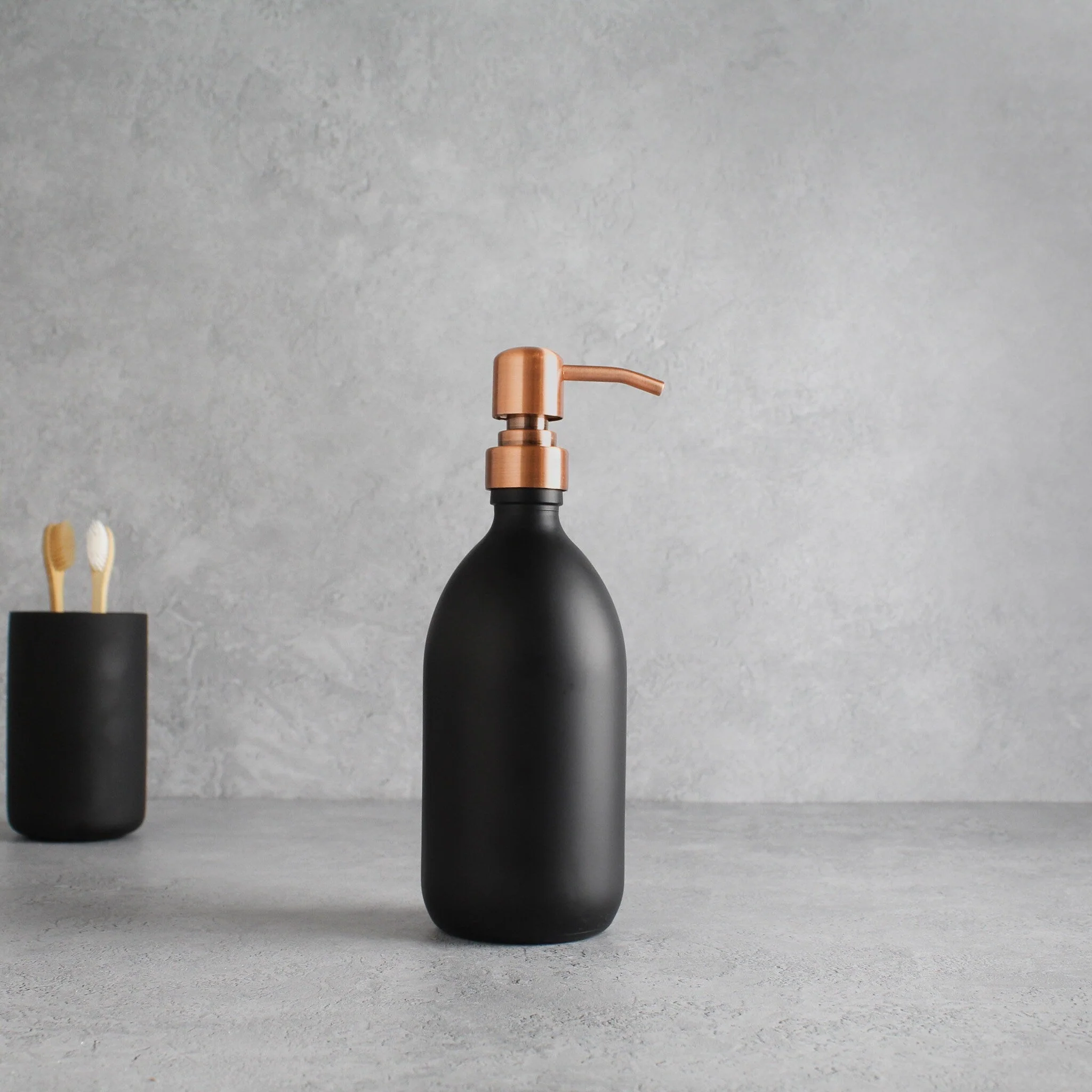 Matte Black Glass Dispenser Bottle With Rose Gold Pump - Image 4