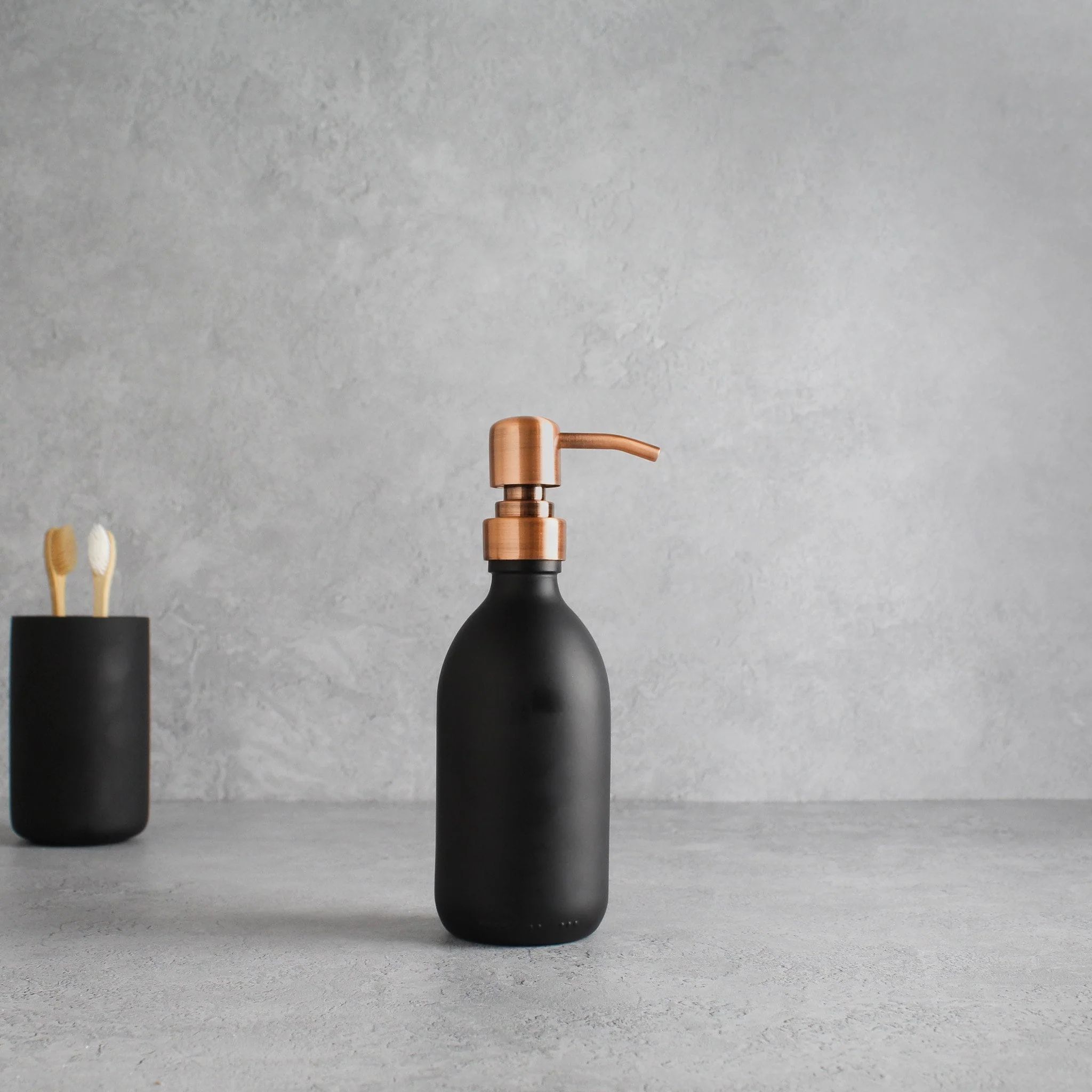 Matte Black Glass Dispenser Bottle With Rose Gold Pump - Image 5