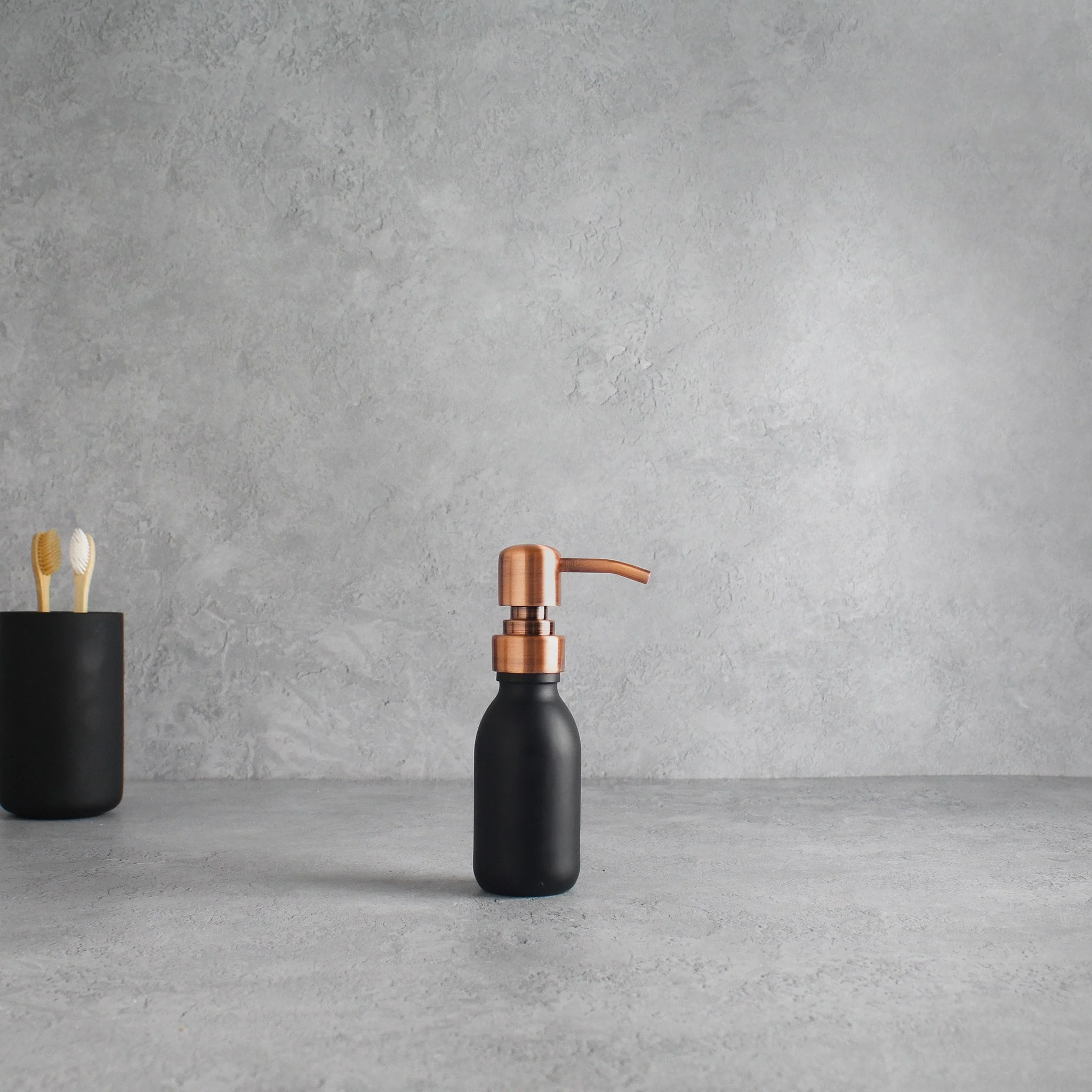 Matte Black Glass Dispenser Bottle With Rose Gold Pump - Image 6