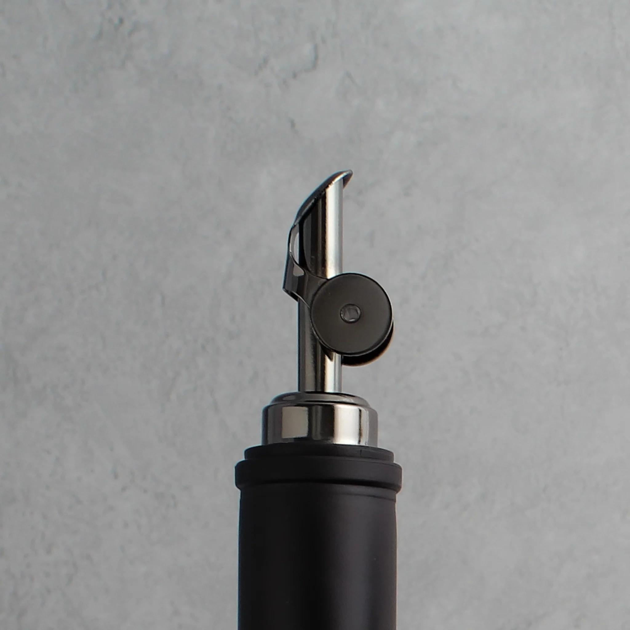 Matte Black Glass Tall Neck Oil Bottle With Label - Image 4